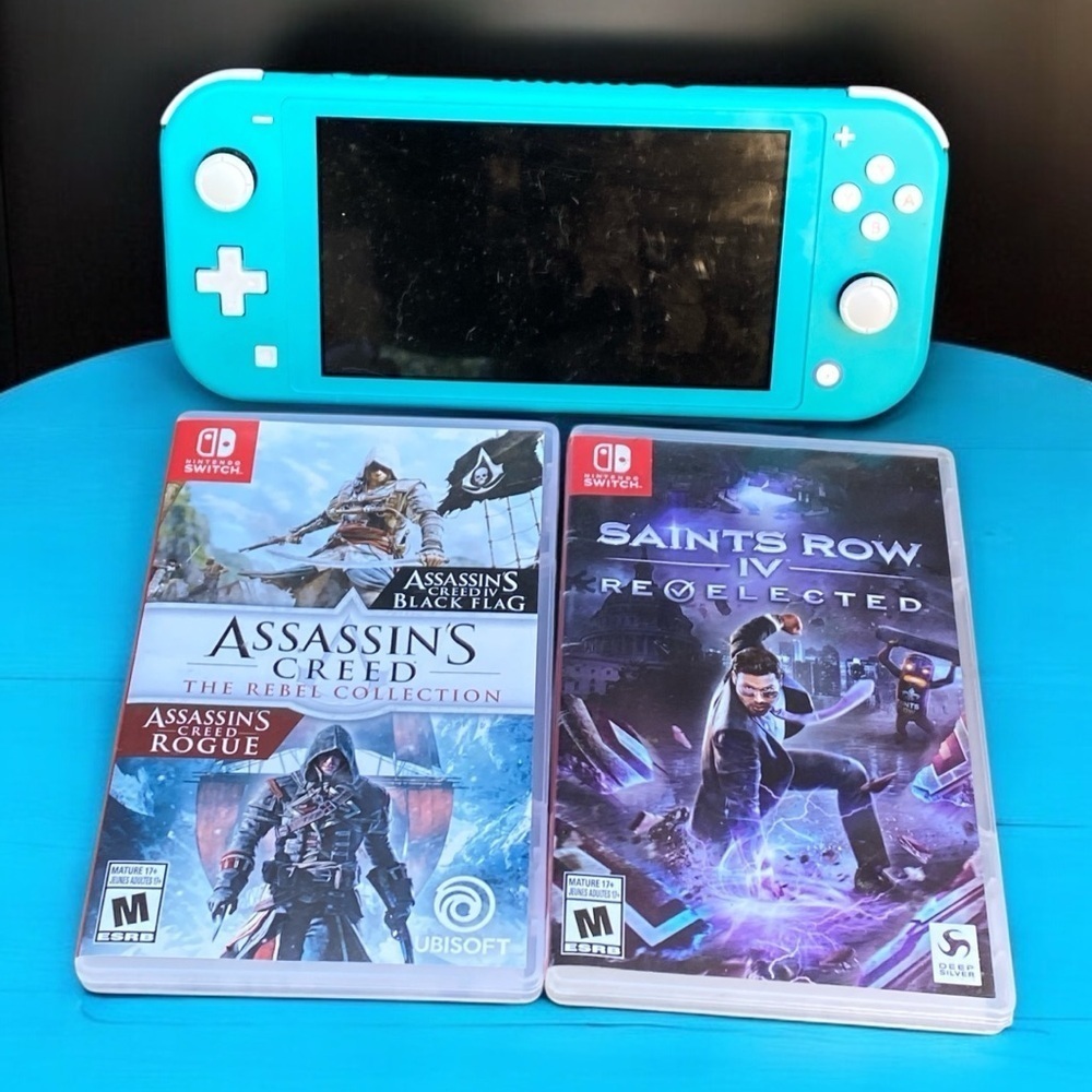 Nintendo Switch Lite Blue Bundle With 2 Games - Assassins Creed & Saints Row